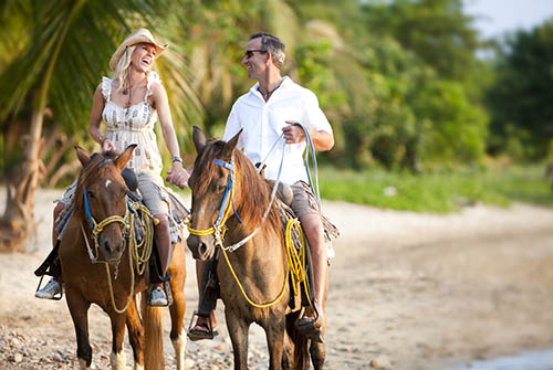 Horse riding on the beach