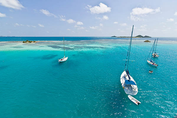 Yachts anchoring behind the reef of Union Island, St. Vincent & the Grenadines