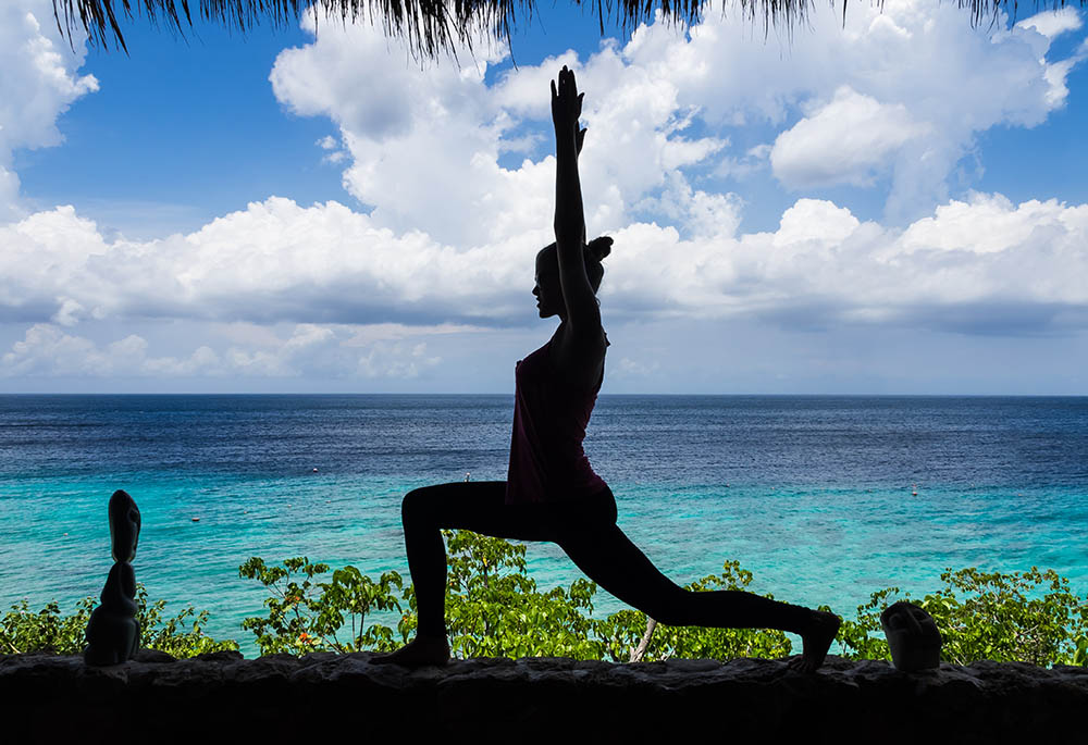 Yoga positions on a Beach on Curacao