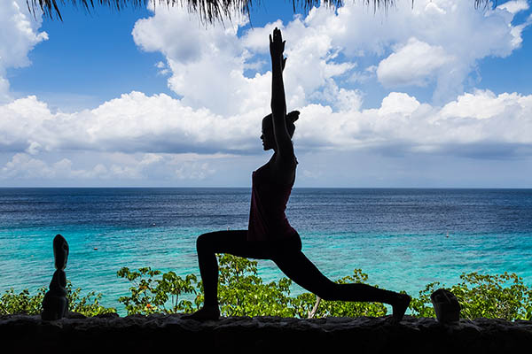 Yoga positions on a Beach on Curacao