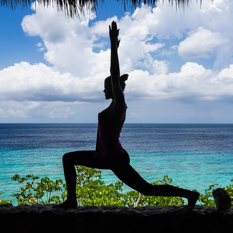 Yoga positions on a Beach on Curacao