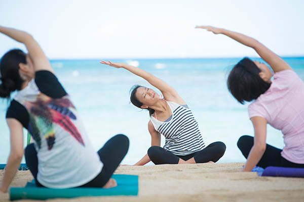 Yoga class on a beach in Japan