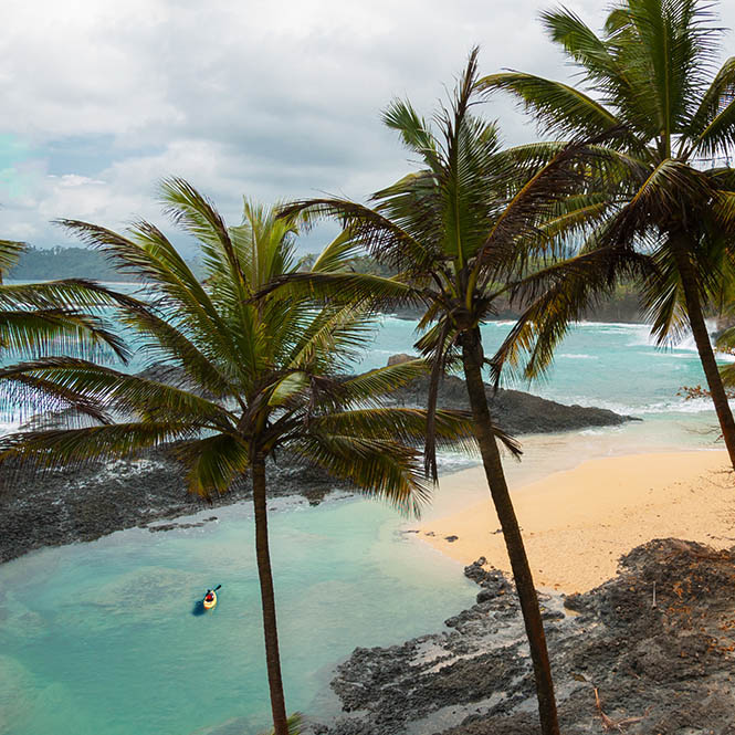 Kayaking off Praia Piscina on the island of Principe