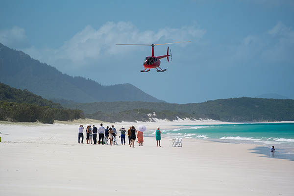 Helicopter landing on Whitehaven Beach, Whitsunday Islands, Queensland