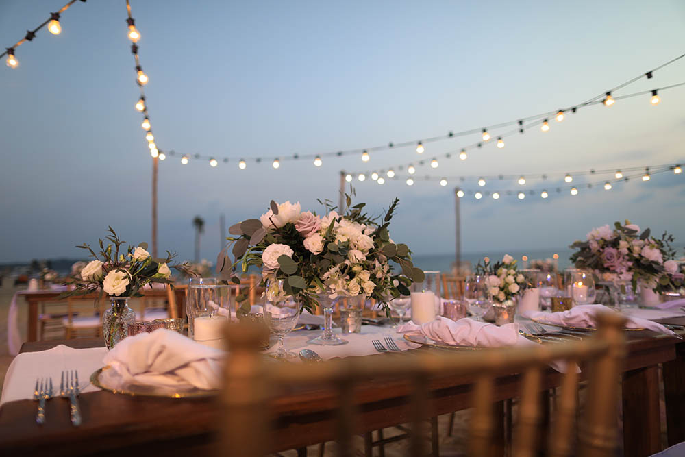 Wedding table set out next to the ocean