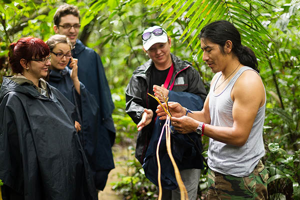 Naturalist Local Guide With Group Of Tourist In Cuyabeno Wildlife Reserve Ecuador