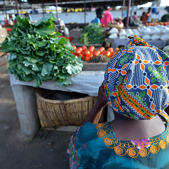 African woman in food market in Kenya