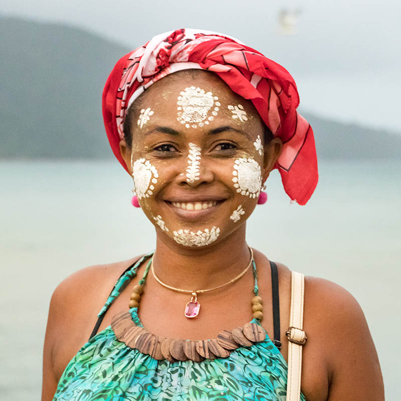 Portrait of a Malagasy woman with her face painted, Vezo-Sakalava tradition, Nosy Be, Madagascar