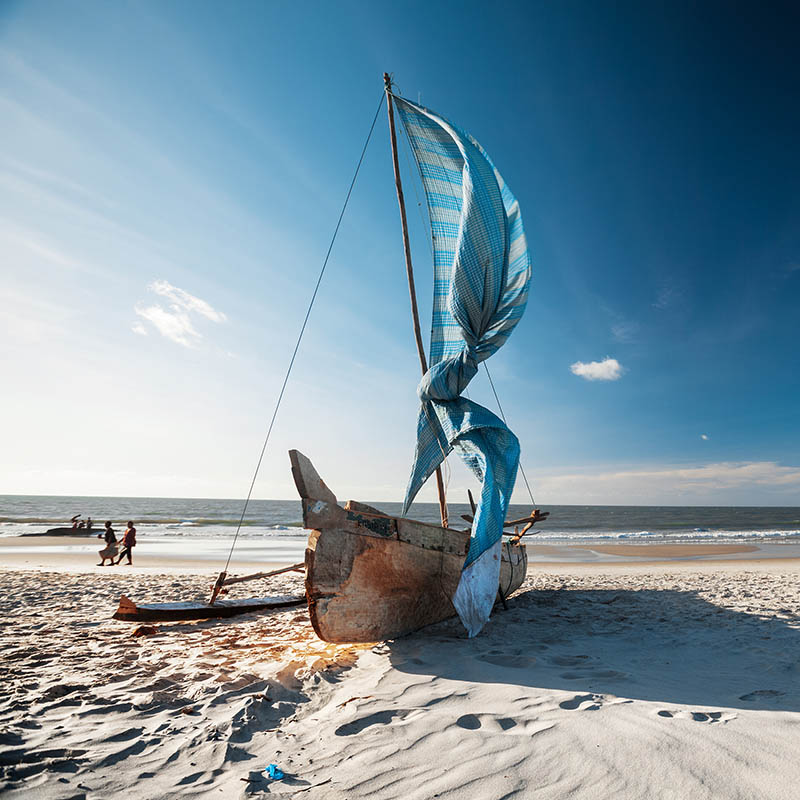 Traditional Malagasy sail boat on the sea coast. Town of Morondava