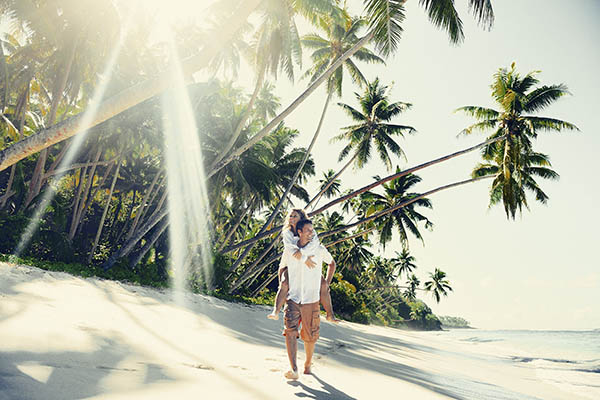 Couple relaxing on a tropical beach