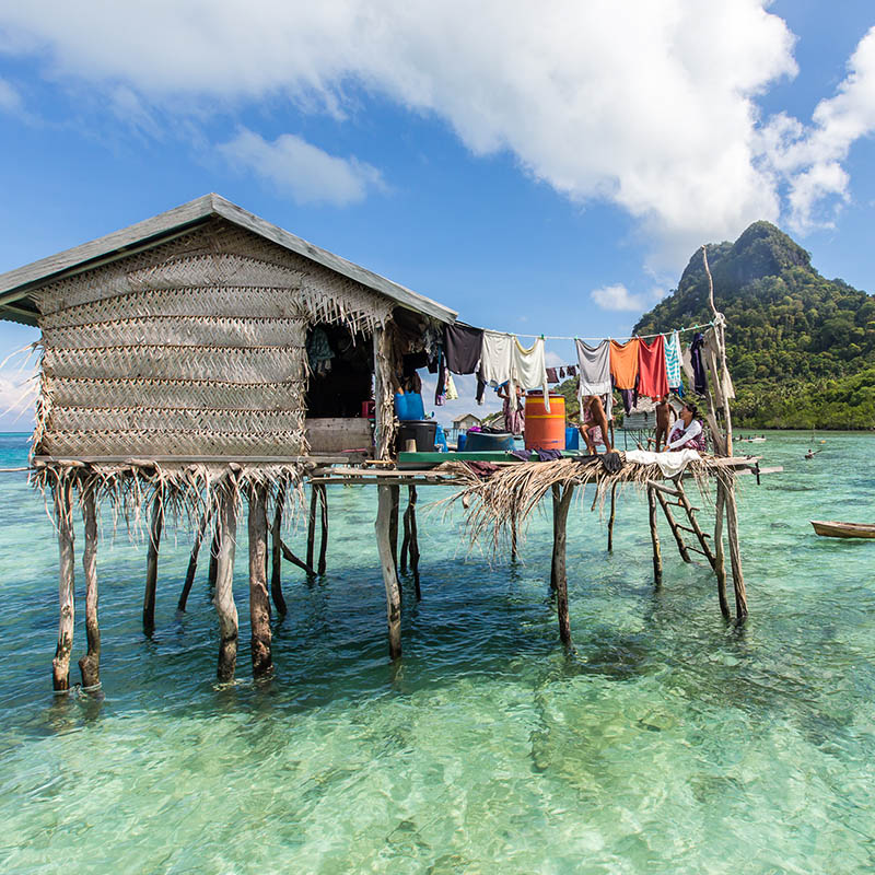 Traditional sea gypsy water village in Bodgaya Island in Tun Sakaran marine park,Semporna,Sabah,Borneo