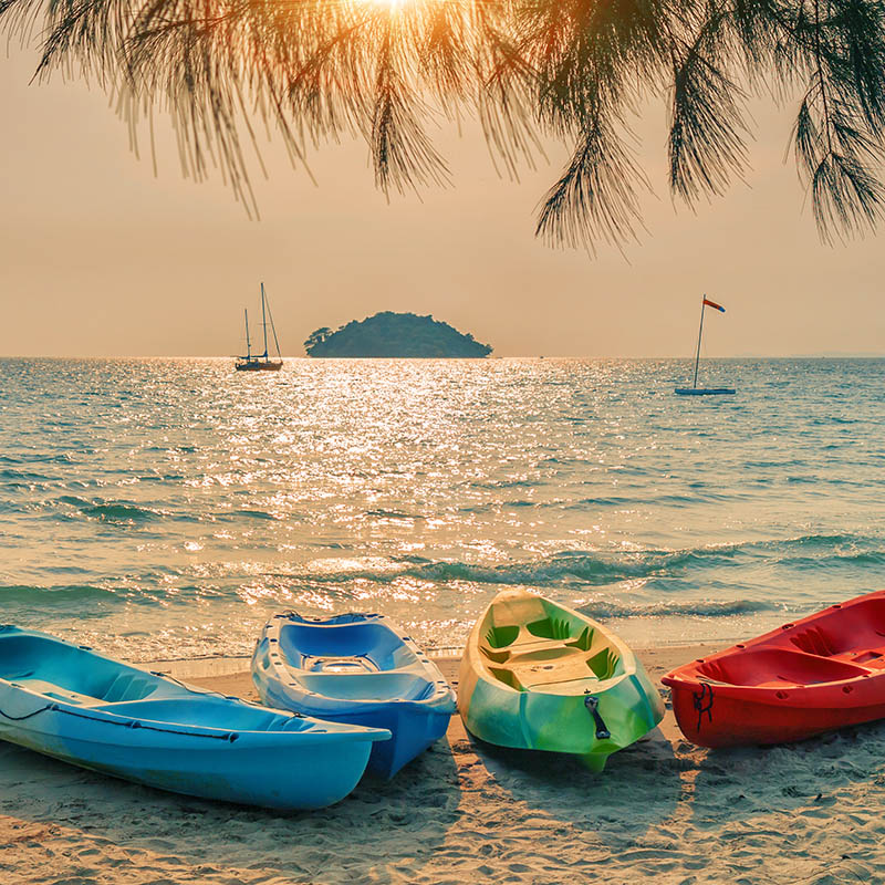 Kayaks on a beach in Sihanoukville, Cambodia