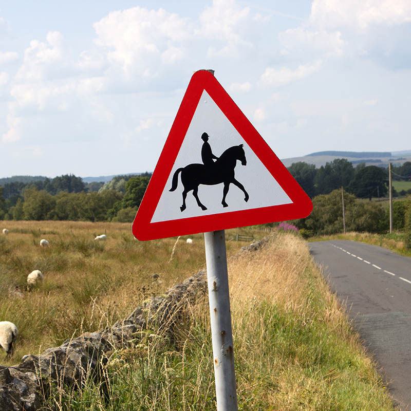 Horse and rider sign by country road