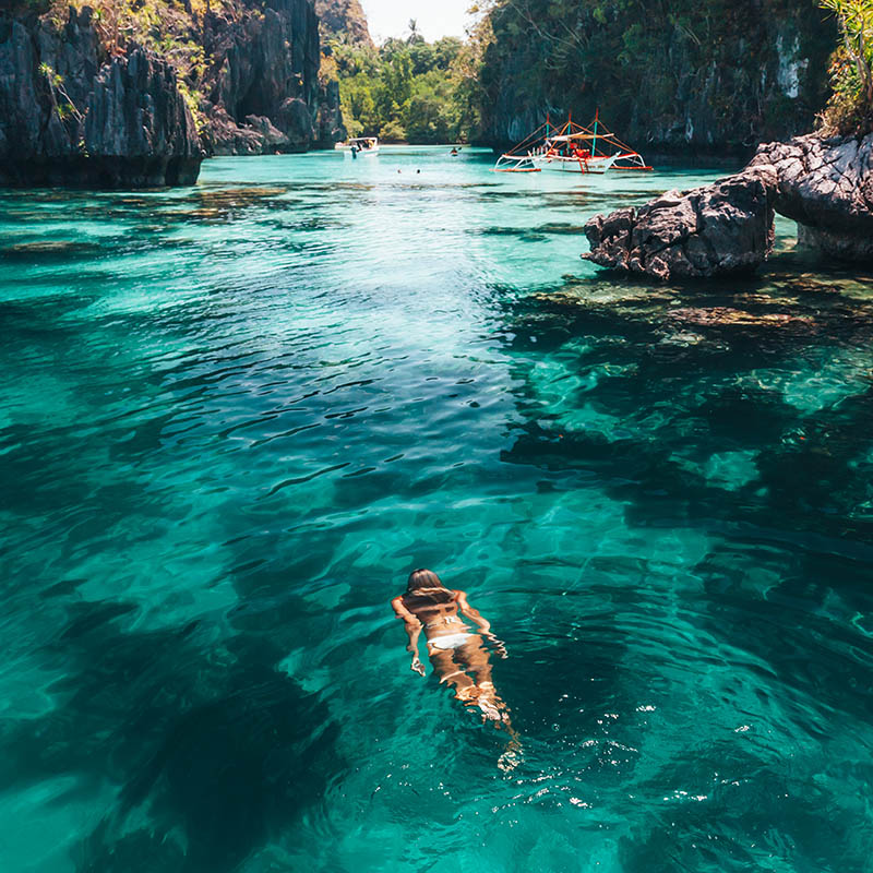 Young woman snorkelling in El Nido, Palawan, Philippines