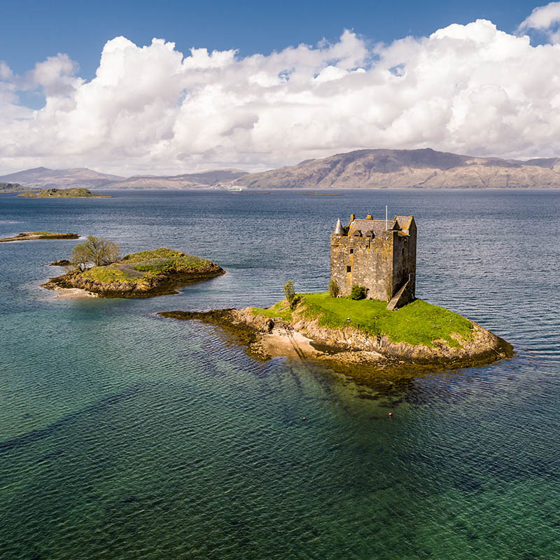 Aerial of the historic castle Stalker in Argyll, Scotland