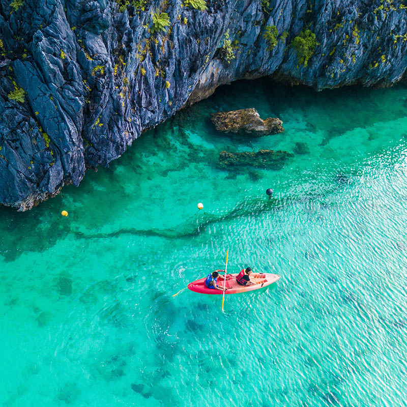 Aerial view of kayakers at Horse Shoe Island in Myanmar