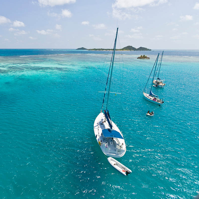 Yachts anchoring behind the reef of Union Island, St. Vincent & the Grenadines