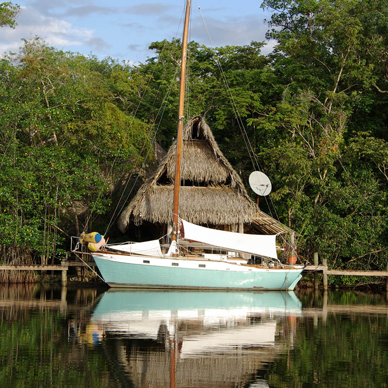 Hut and boat in the forests of Guatemala, Central America