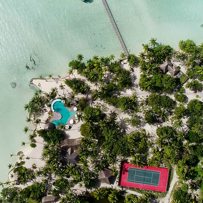 Aerial view of a tennis court in French Polynesia