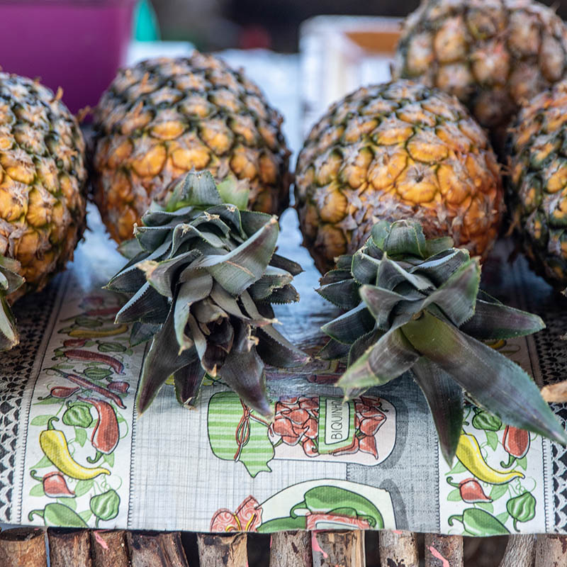 Pineapples for sale in small street market in Hawaii