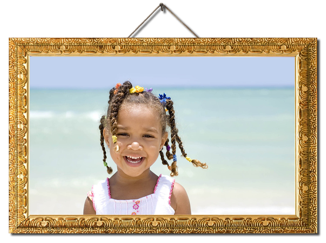 Close-up of an Afro Caribbean young girl with an ocean background