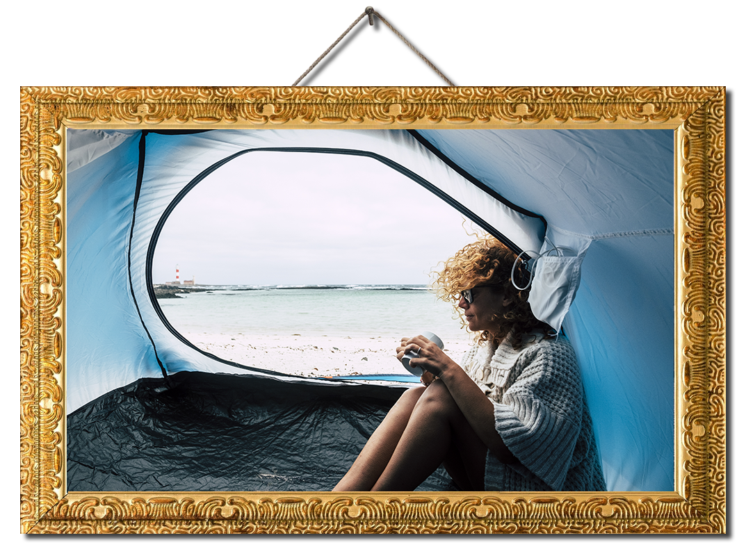 woman inside a tent camping at the beach