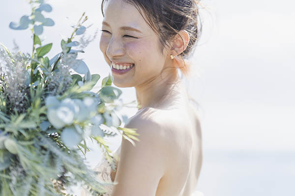 Close-up of a Japanese bride overlooking the sea