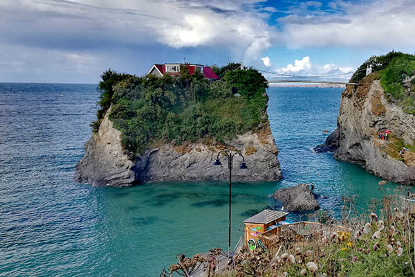 House on a tiny island on Towan Beach in Newquay, Cornwall