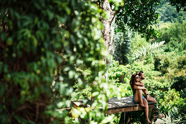 Couple sitting amongst nature