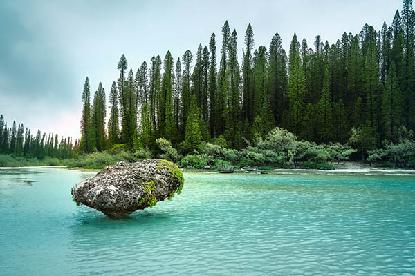 shallow enclosed lagoon with crystal clear water at Isle of Pines, New Caledonia