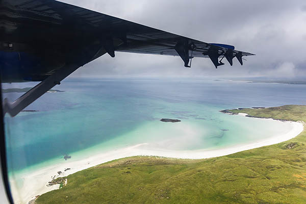 The view from the airplane as it flies over the Isle of Barra, Outer Hebrides, Scotland