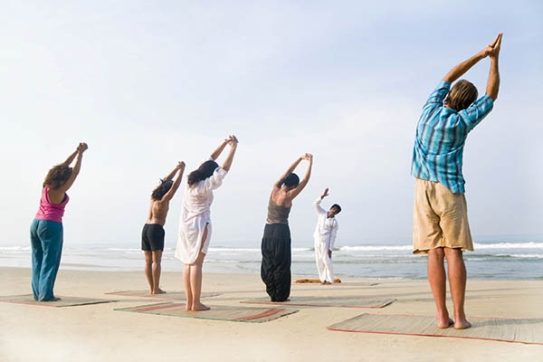 Yoga class on the beach in India