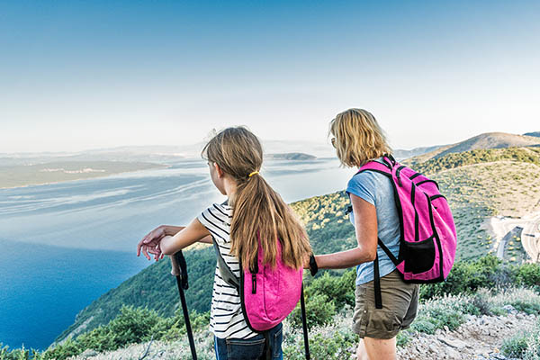 Mother and daughter on holiday hiking on Cres Island in Croatia