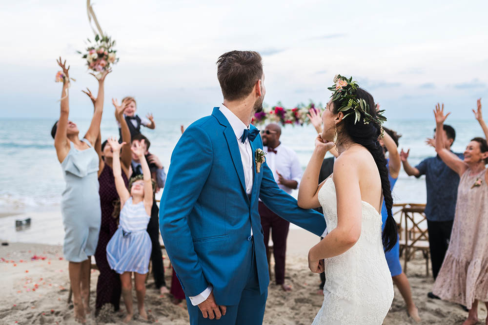 Young couple in a wedding ceremony at the beach