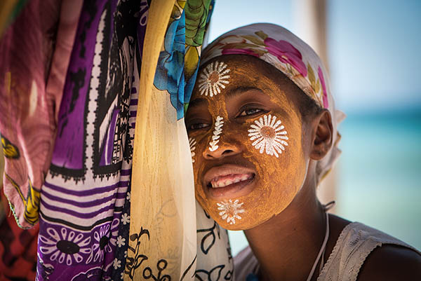 Close up of a woman in Madagascar wearing traditional face makeup