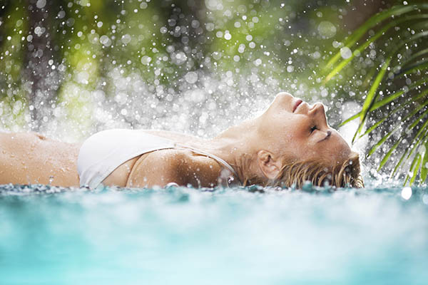 Close up of a woman relaxing in a swimming pool