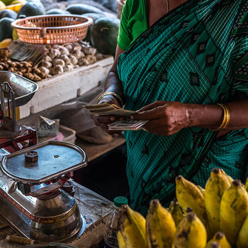 Indian woman at a fruit and vegetable market