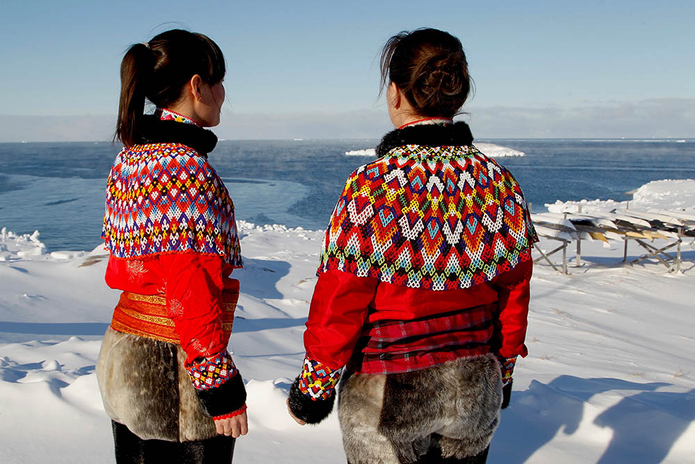 Two women wearing traditional Greenlandic national costume in Greenland