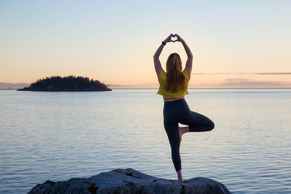 Woman in Yoga pose in Vancouver, British Columbia